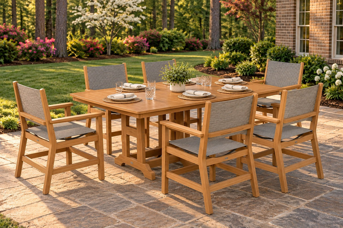 Berlin Gardens Mayhew Sling 44" x 72" Dining Set for 6 on a backyard patio