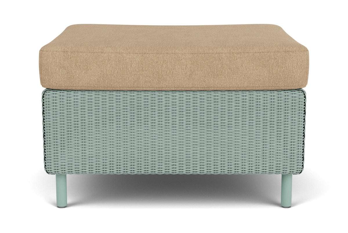 Lloyd Flanders Visions Ottoman in Sea Glass frame with Hayden Sand fabric
