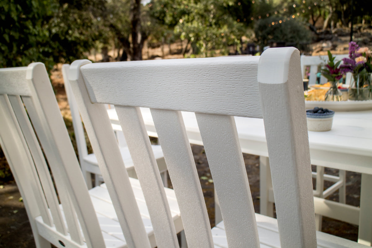 Styled photo of the POLYWOOD Vineyard Bar Side Chair in Vintage White in a bar set, view 1