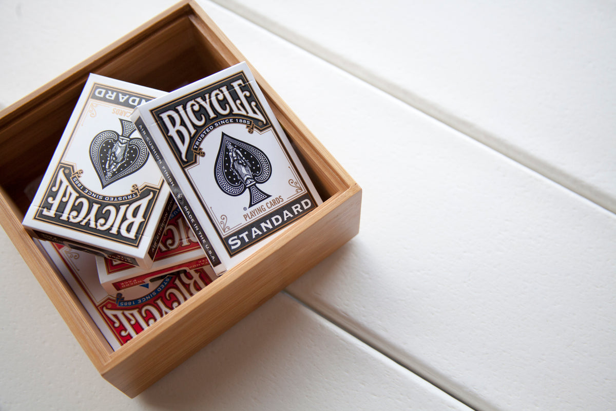 Playing cards on the White POLYWOOD Newport 22" x 36" Coffee Table