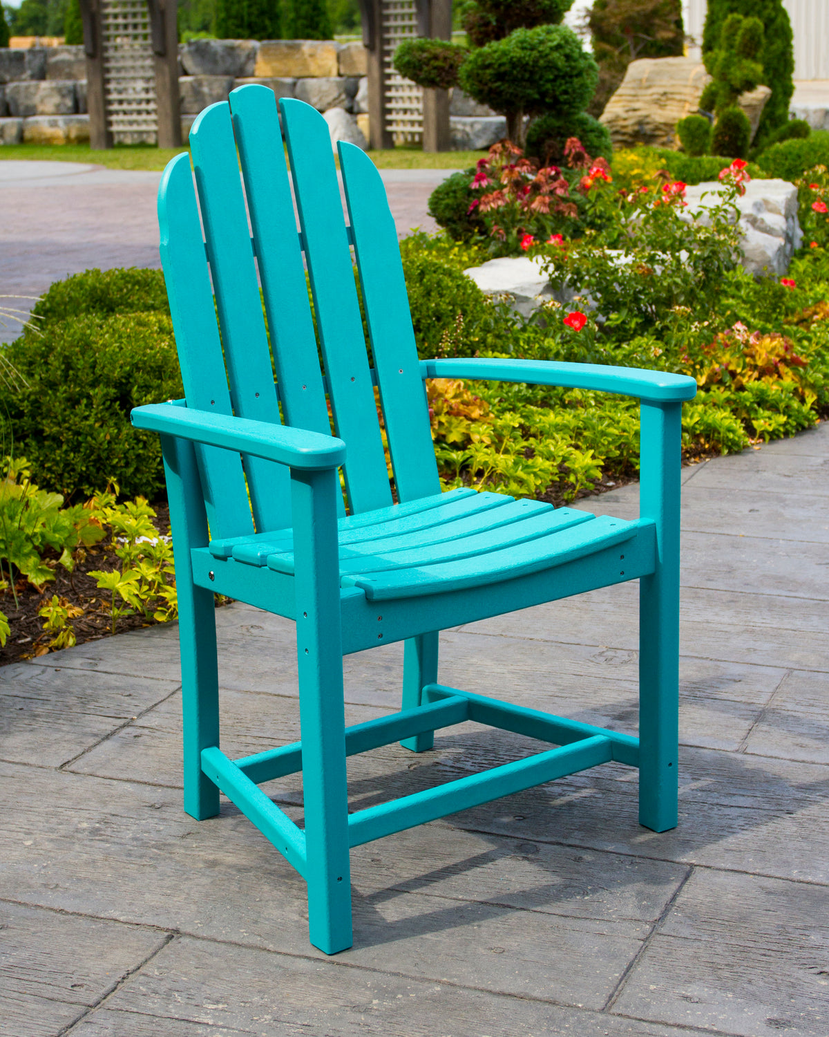 POLYWOOD Classic Adirondack Dining Chair in Aruba in an outdoor setting