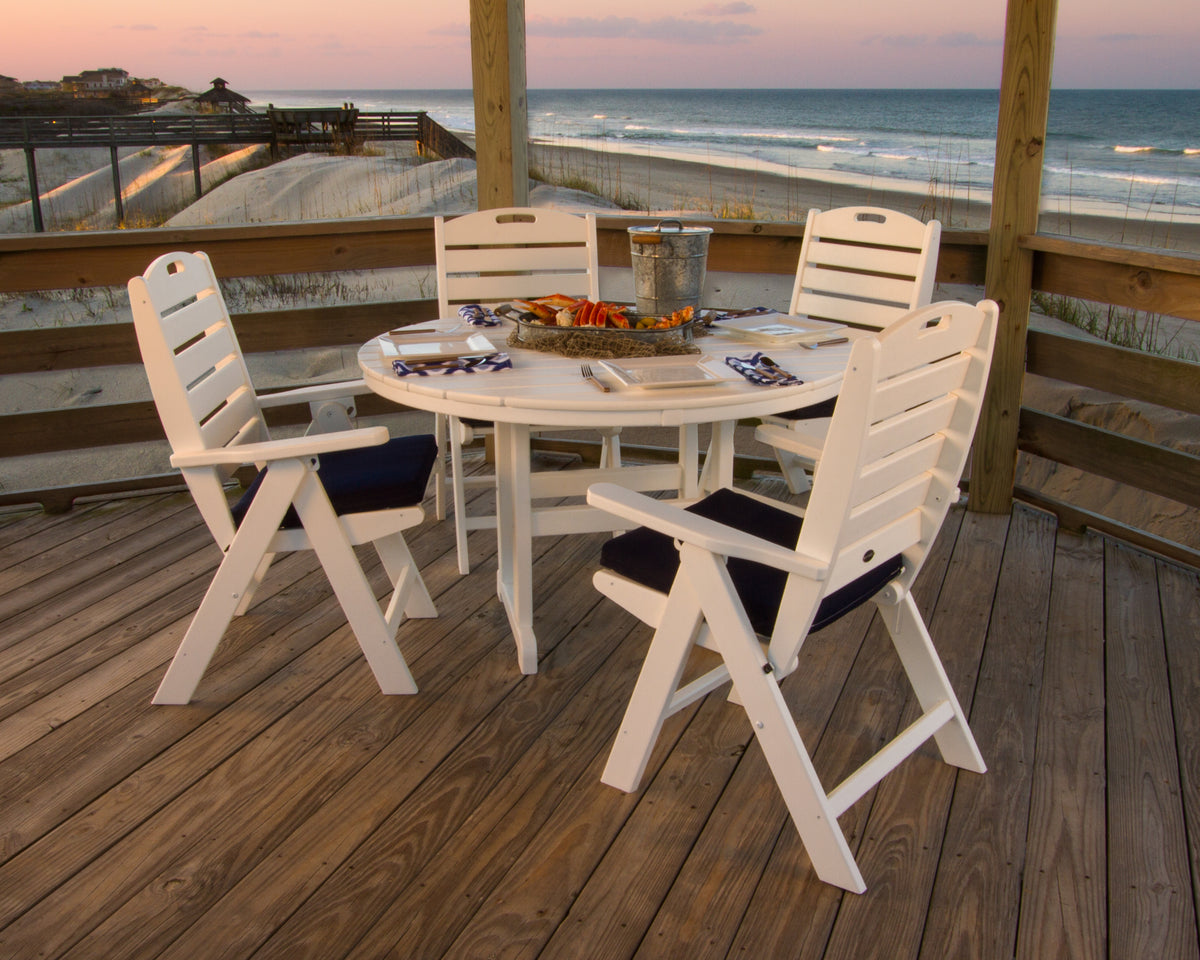 POLYWOOD Nautical Folding Chair 5-Piece Round Farmhouse Dining Set in White in an outdoor setting