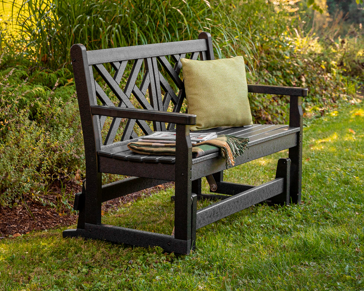 POLYWOOD Chippendale 48" Glider in Black in an outdoor setting (2)