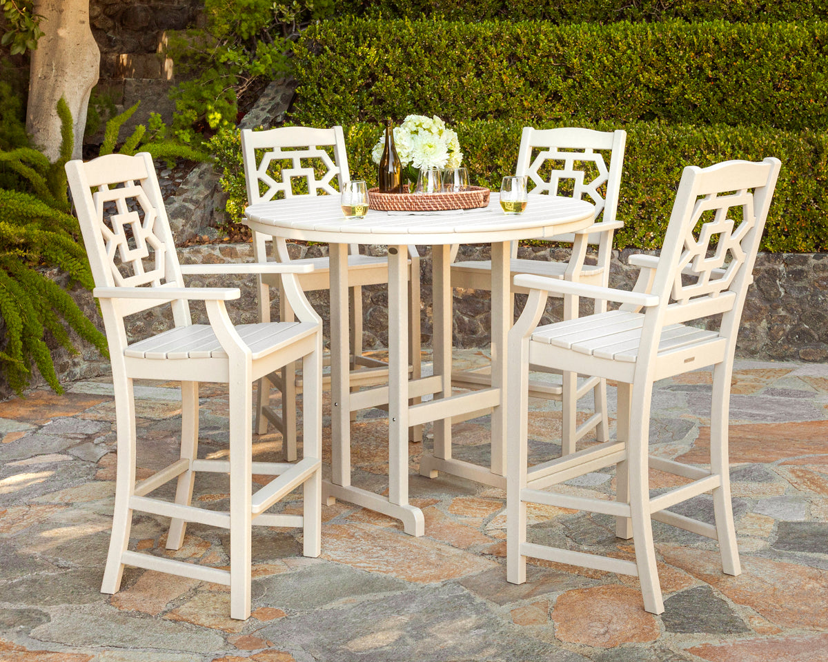 POLYWOOD Chinoiserie Bar Arm Chair in Sand styled outdoors