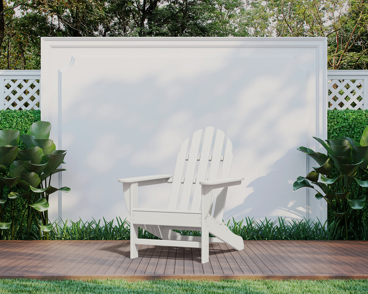 Lifestyle photo of the POLYWOOD Classic Adirondack Chair in White