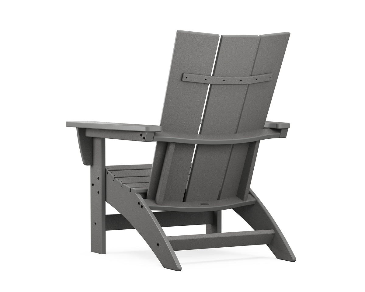Angled view of the POLYWOOD Modern Grand Adirondack Chair in Slate Grey