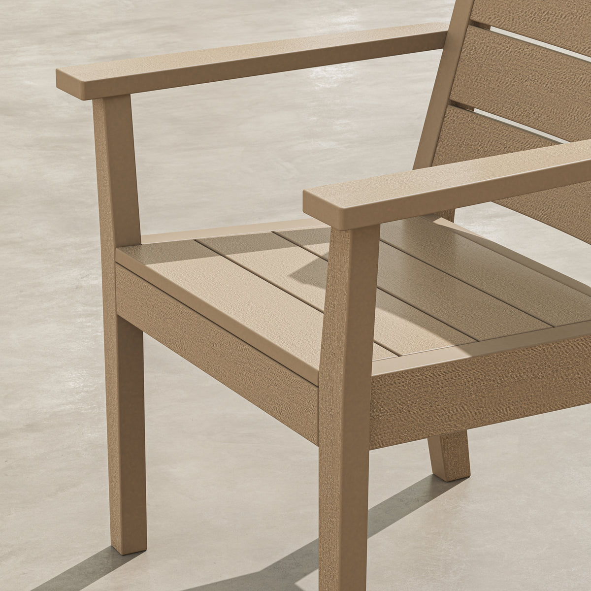 Angled view of the POLYWOOD Latitude Dining Arm Chair in Vintage Sahara