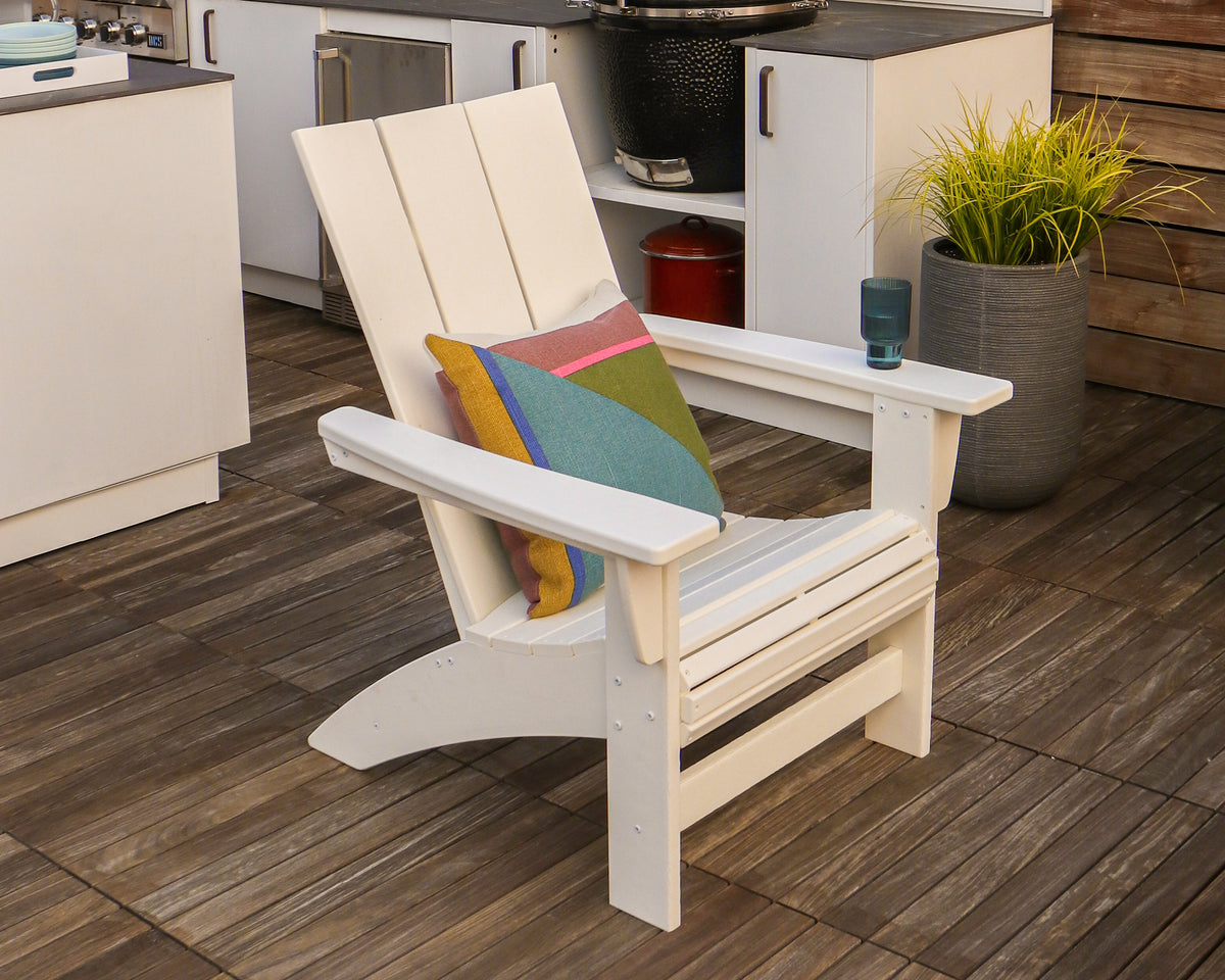 POLYWOOD Modern Grand Adirondack Chair in White styled outdoors