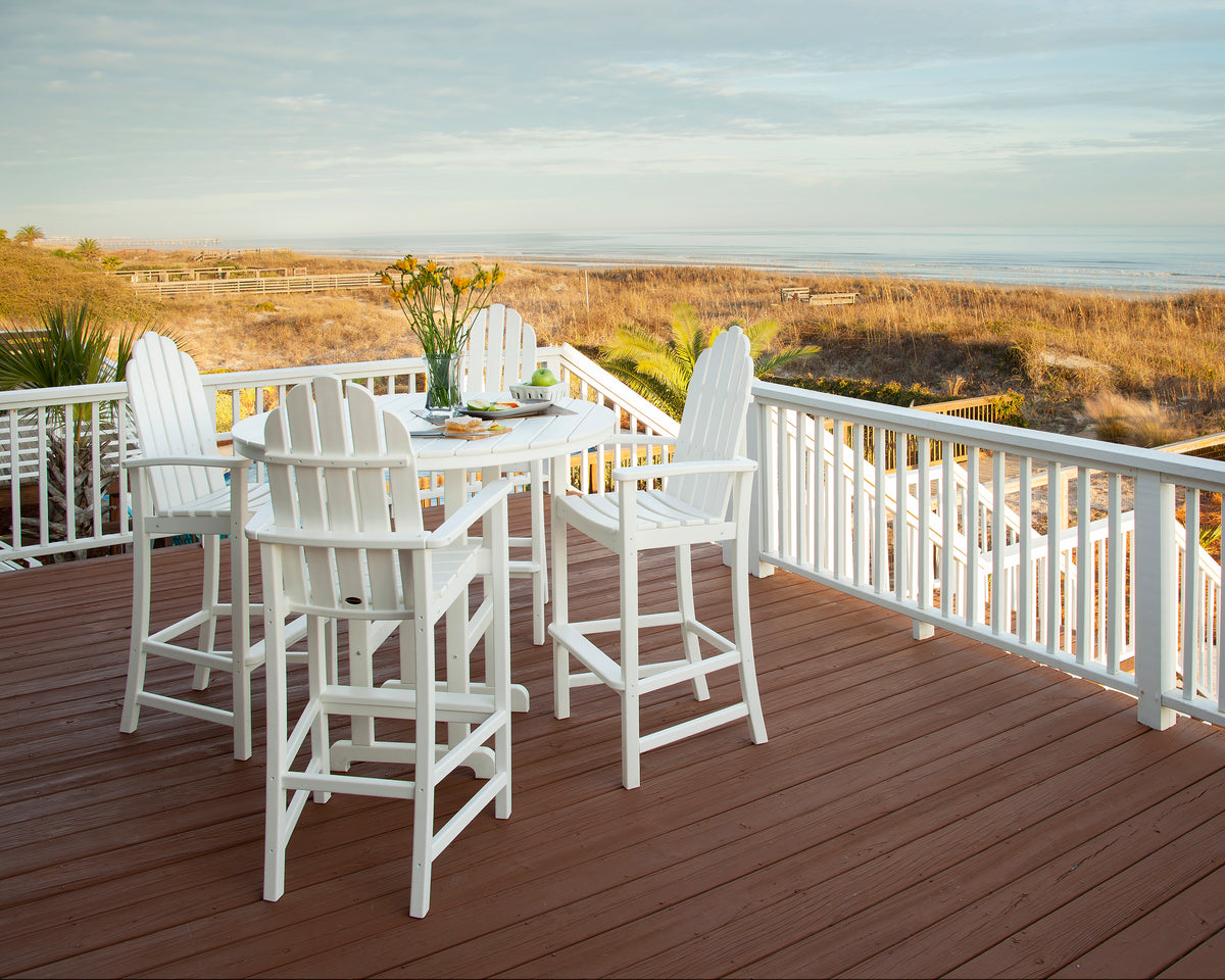 Lifestyle photo of the POLYWOOD Classic Adirondack Bar Chair in White