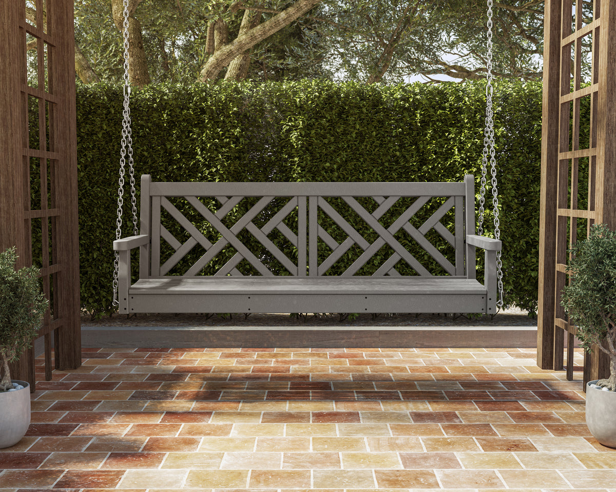 POLYWOOD Chippendale 60" Swing in Slate Grey in an outdoor setting