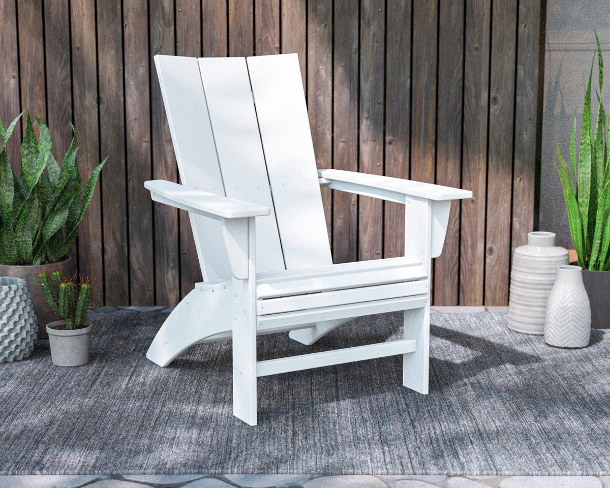 Lifestyle photo of the POLYWOOD Modern Curveback Adirondack Chair in White