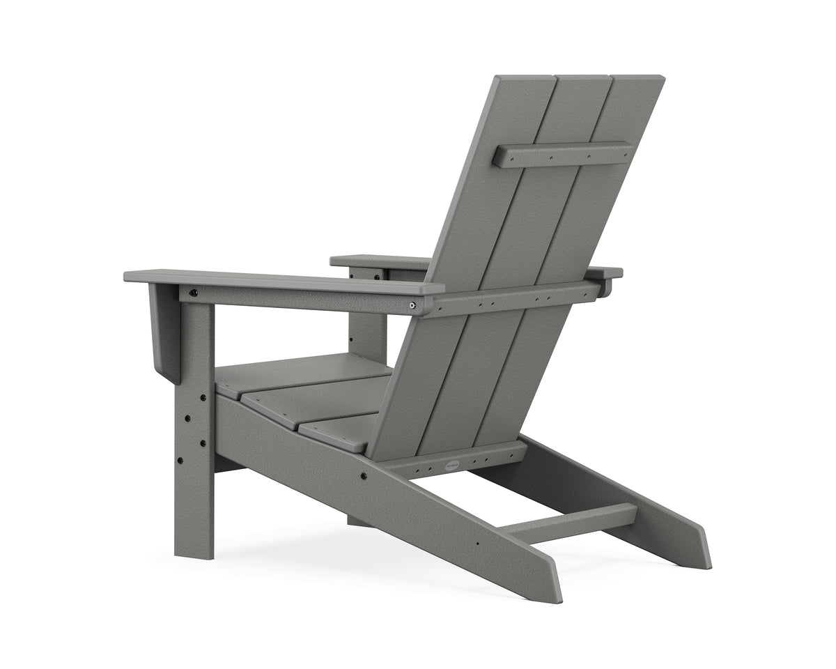 Angled view of the POLYWOOD Modern Studio Adirondack Chair in Slate Grey