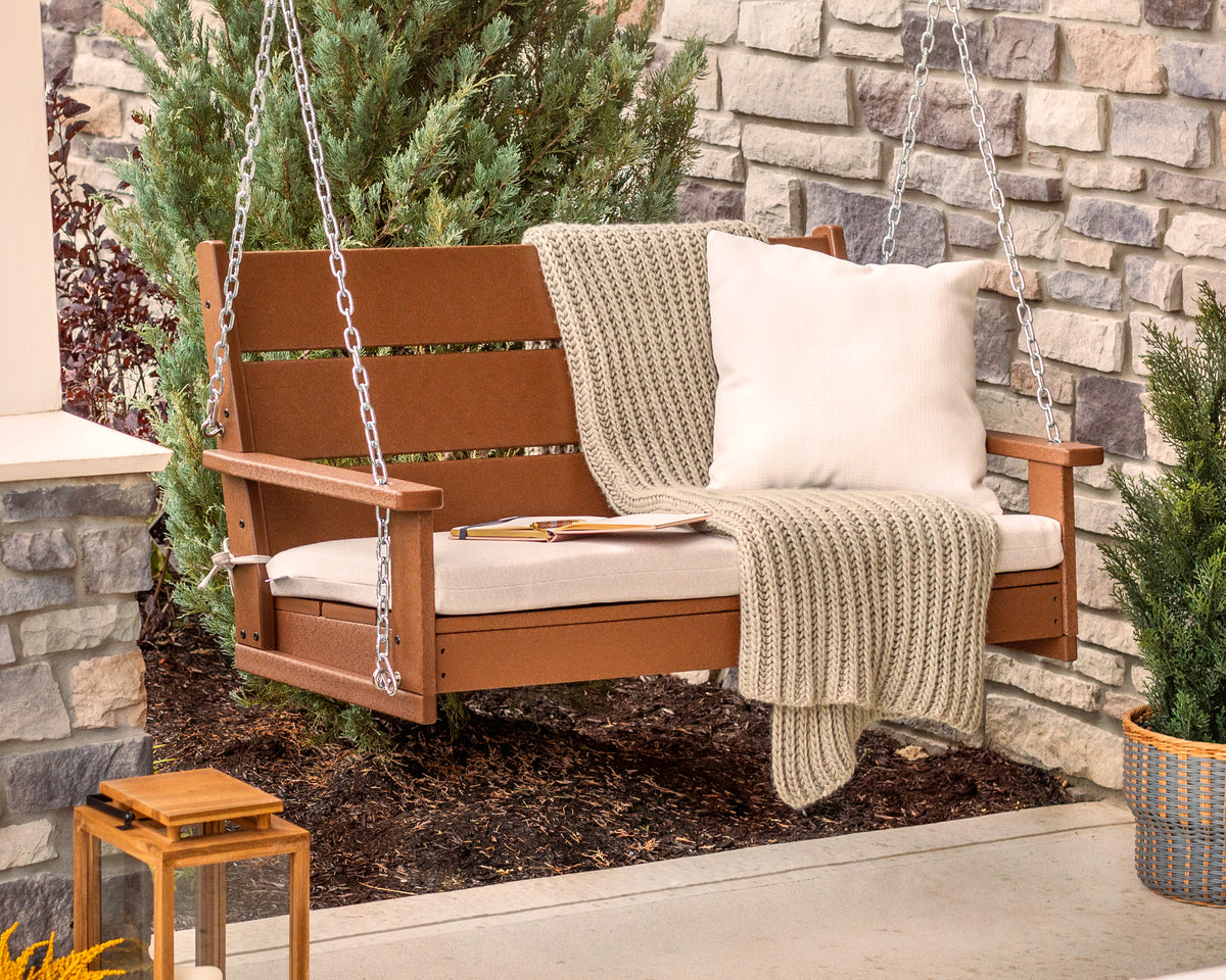 POLYWOOD Lakeside 48" Swing in Teak styled outdoors