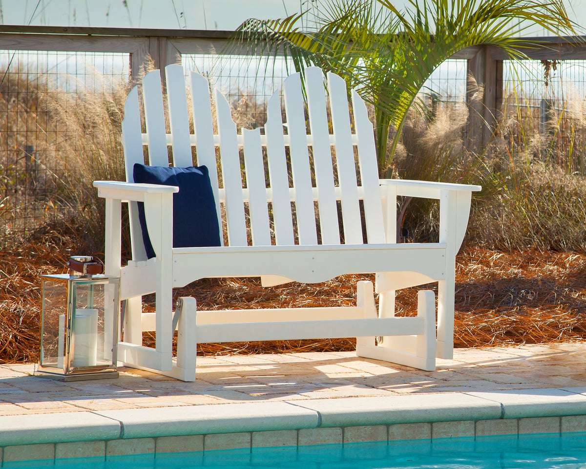 Lifestyle photo of the POLYWOOD Classic Adirondack 48" Glider in White