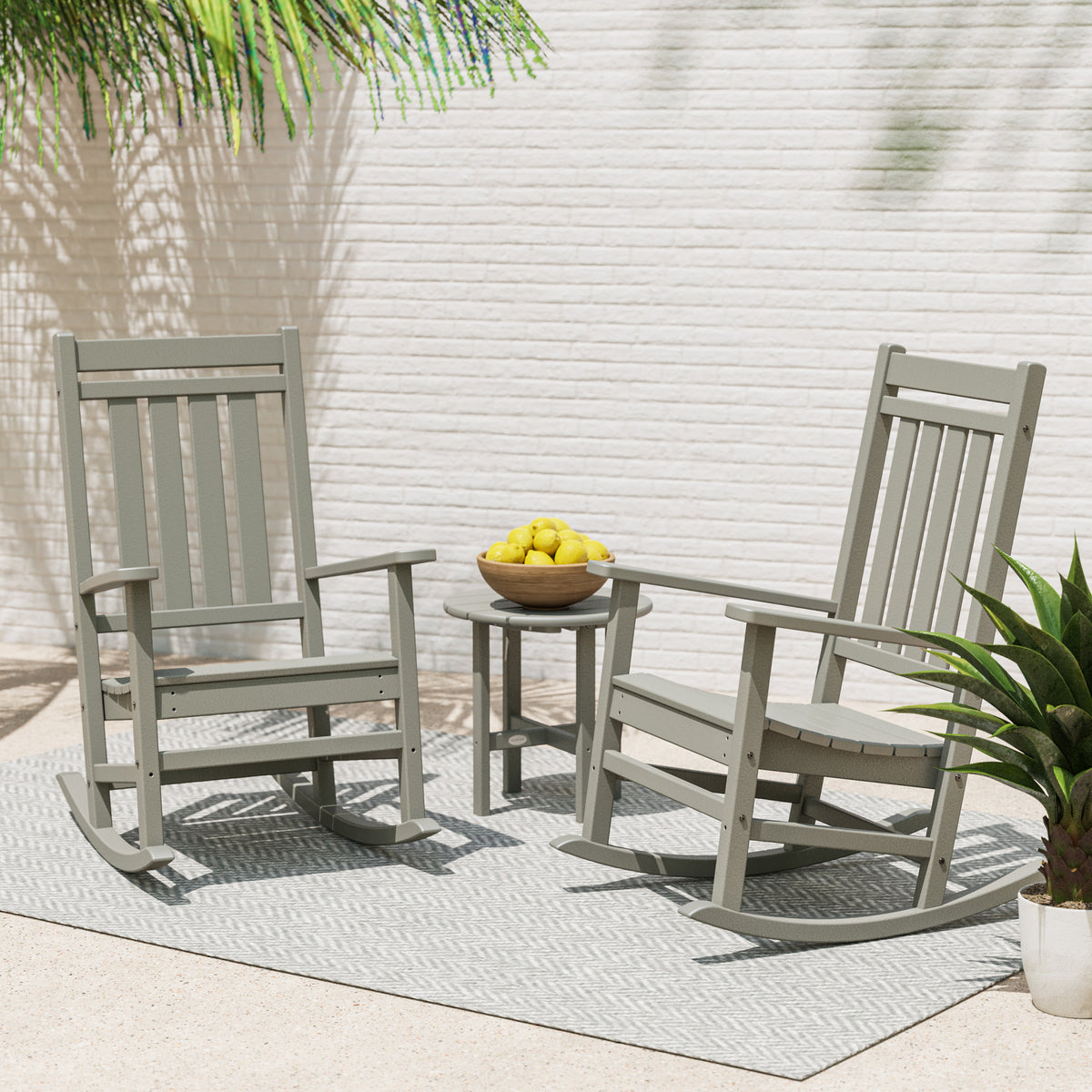 POLYWOOD Estate 3-Piece Rocking Chair Set in an outdoor setting