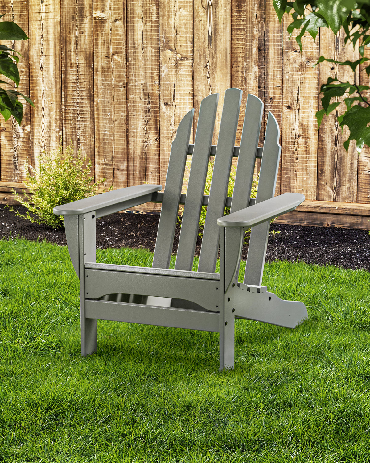 Lifestyle photo of the POLYWOOD Classic Adirondack Chair