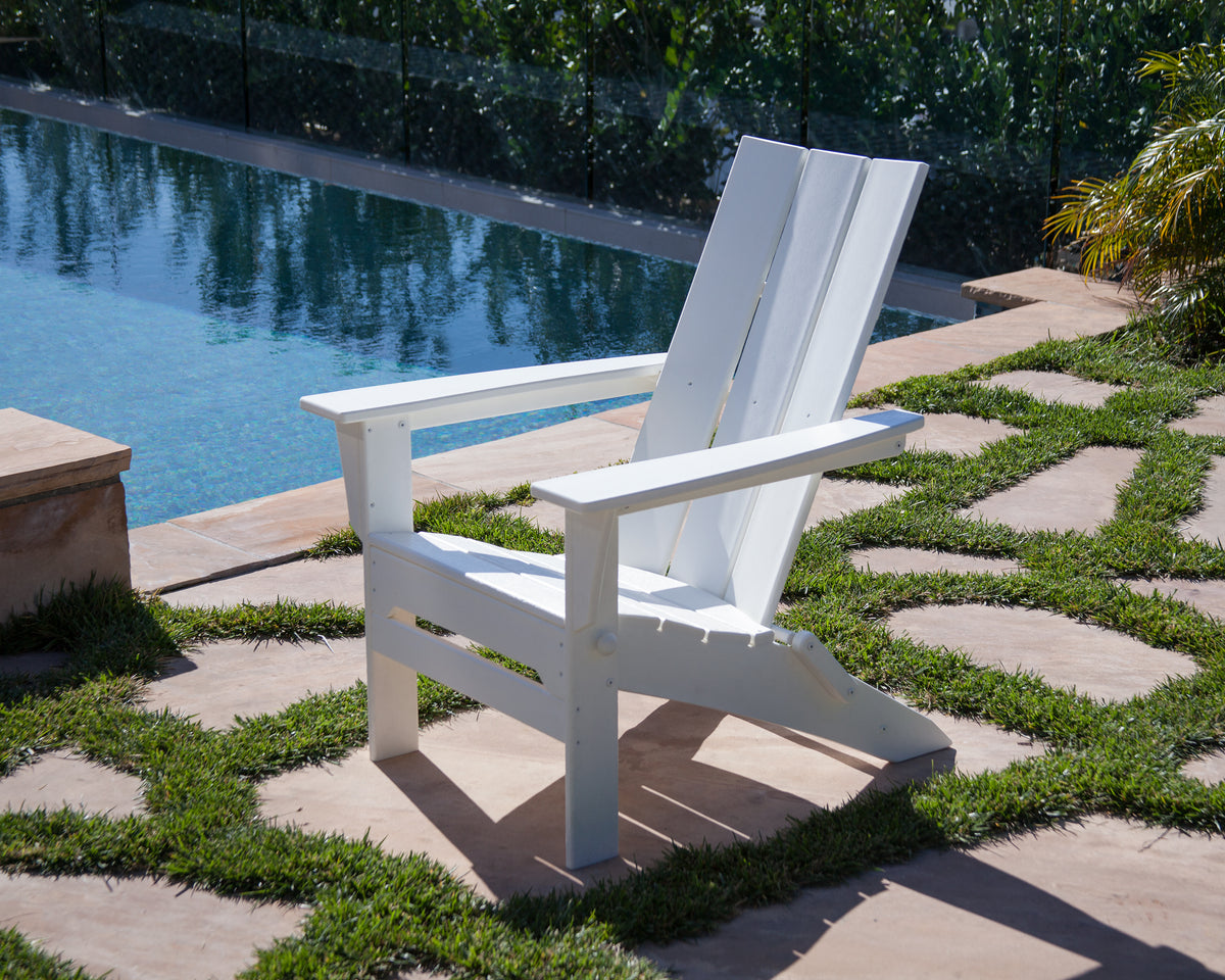 POLYWOOD Modern Folding Adirondack in White styled outdoors