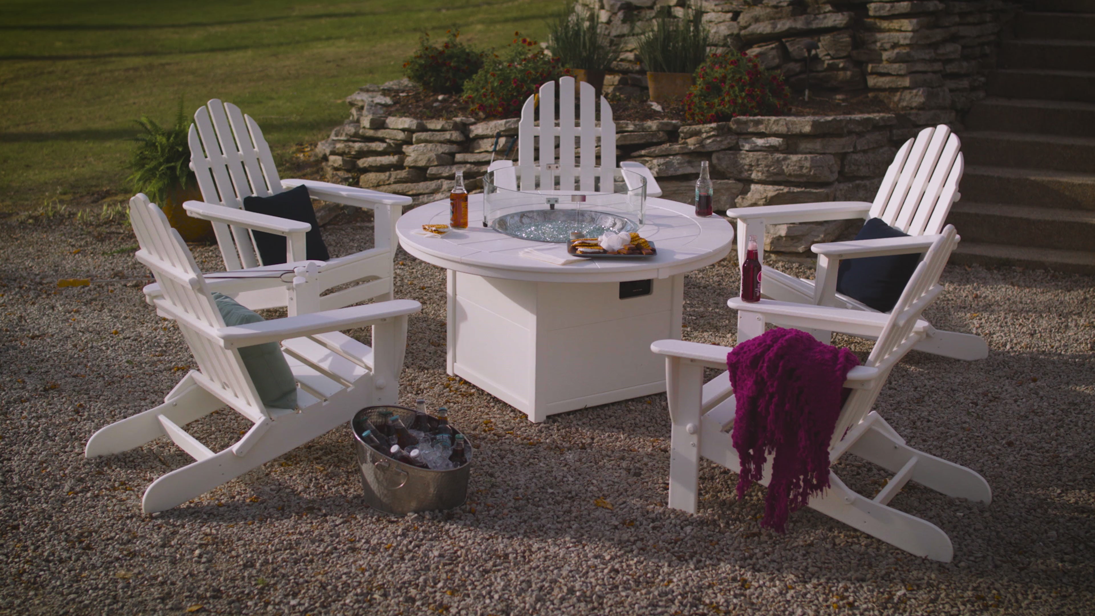 video going over the basics of Polywood white outdoor fire pit round