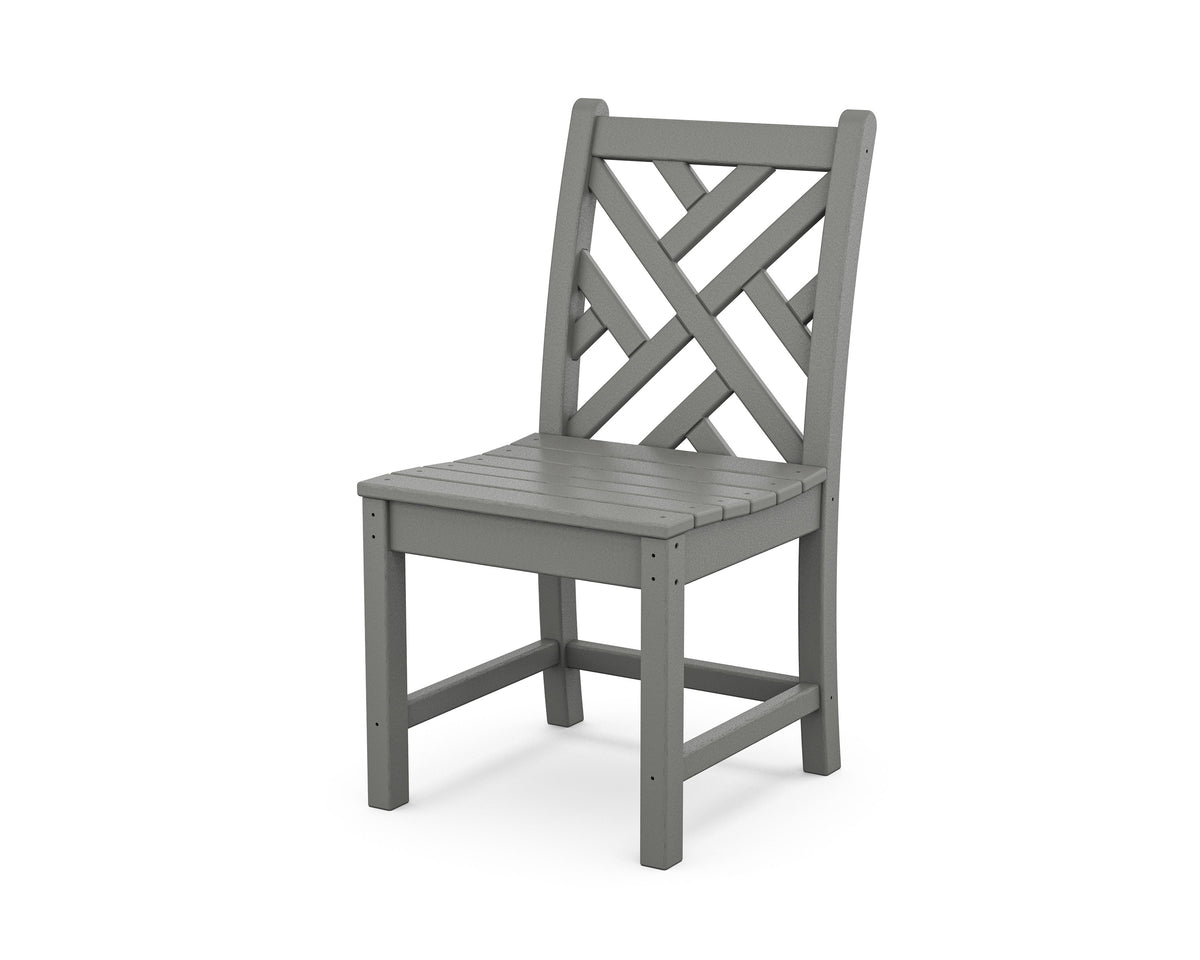 Angled view from the POLYWOOD Chippendale 7-Piece Farmhouse Trestle Dining Set in Slate Grey