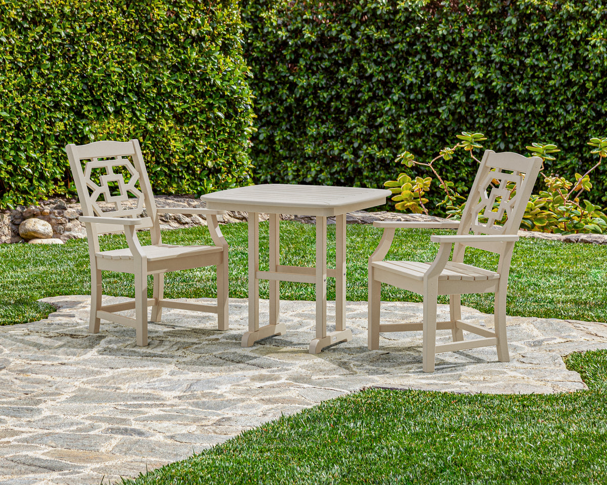 Lifestyle photo of the POLYWOOD Chinoiserie 3-Piece Dining Set