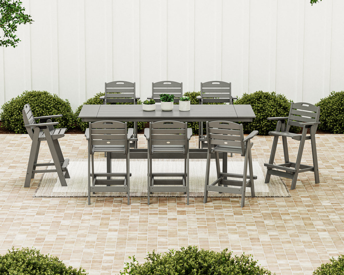 Lifestyle photo of the POLYWOOD Nautical 9-Piece Farmhouse Bar Set with Trestle Legs