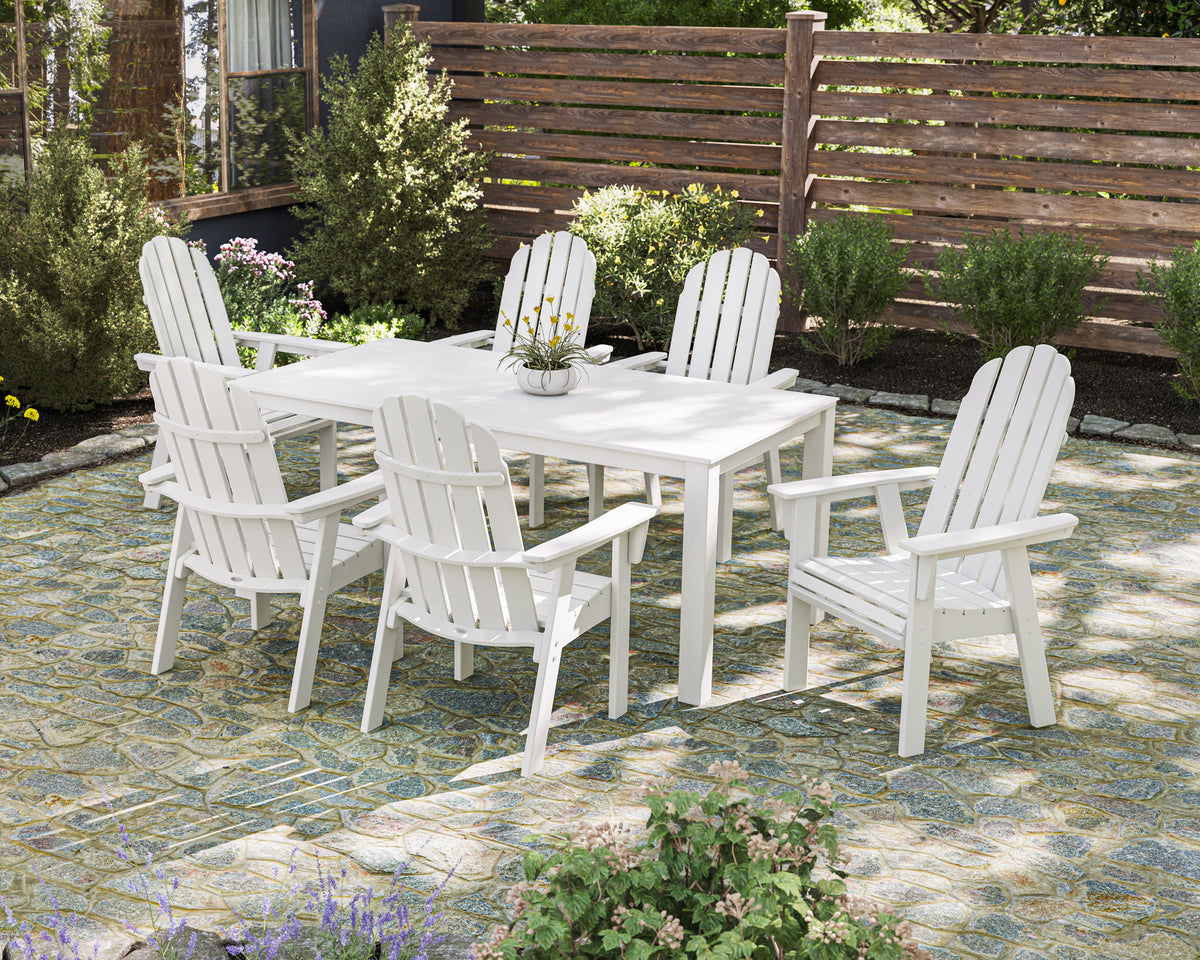 Lifestyle photo of the POLYWOOD Vineyard Curveback Adirondack 7-Piece Parsons Dining Set