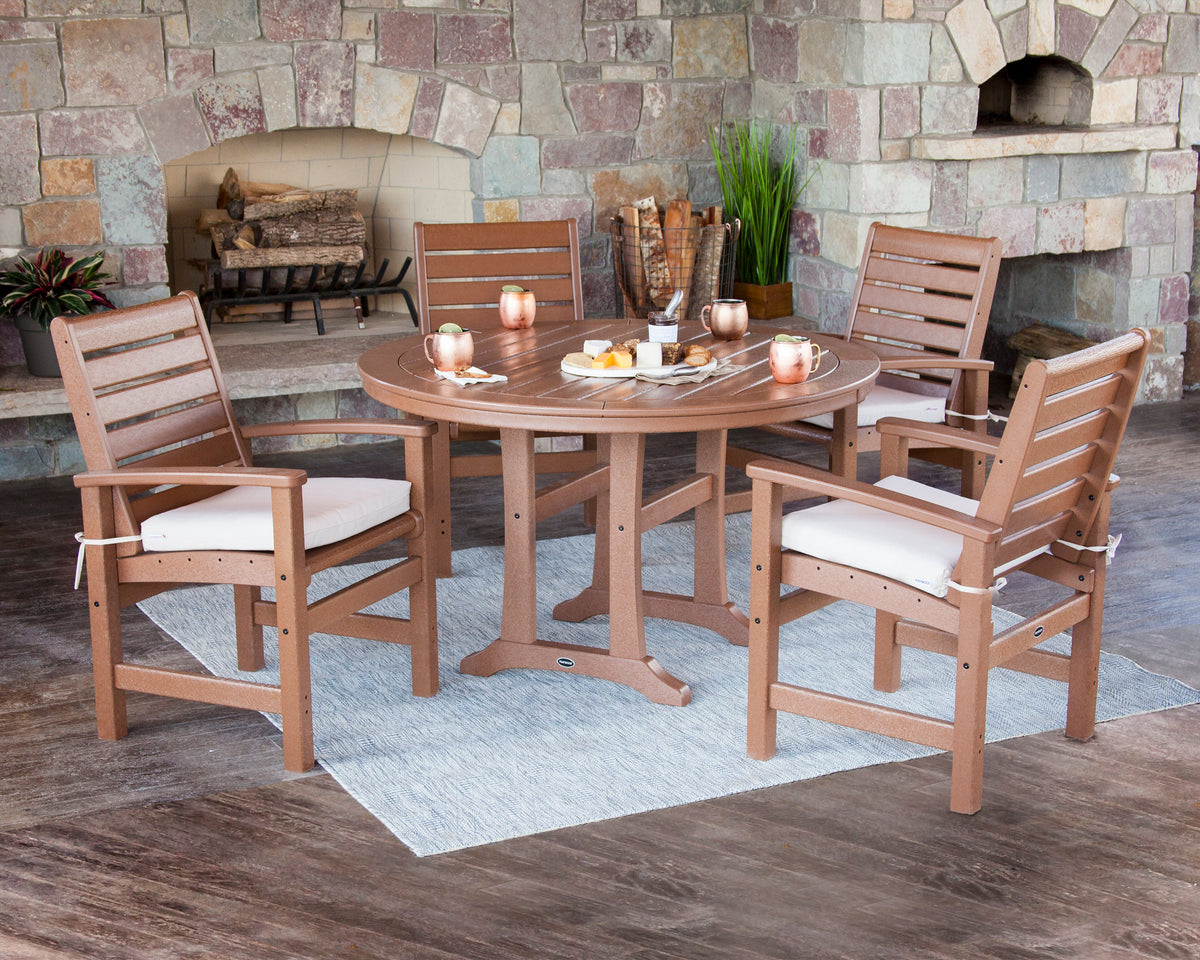 Lifestyle photo of the POLYWOOD Signature 5-Piece Round Dining Set with Trestle Legs