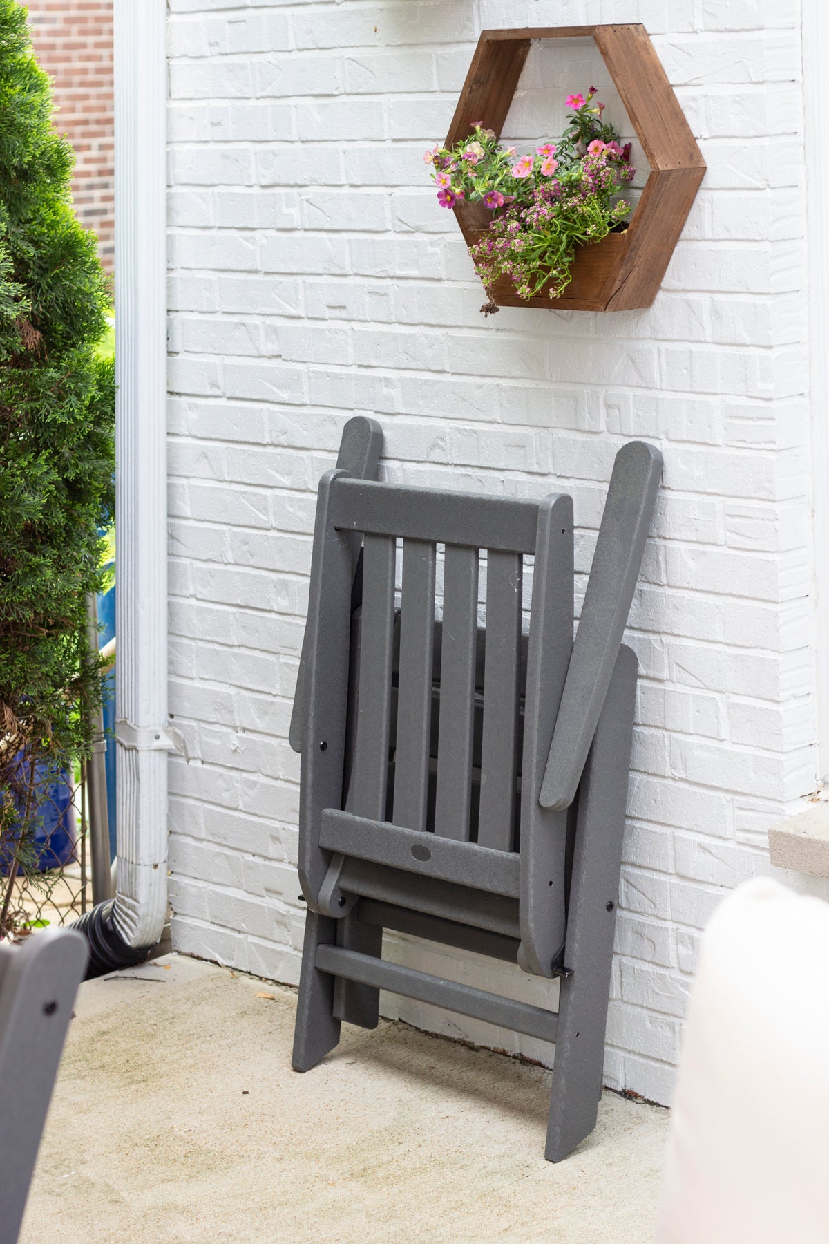 Detail photo of the POLYWOOD Vineyard Folding Chair 7-Piece Dining Set with Trestle Legs