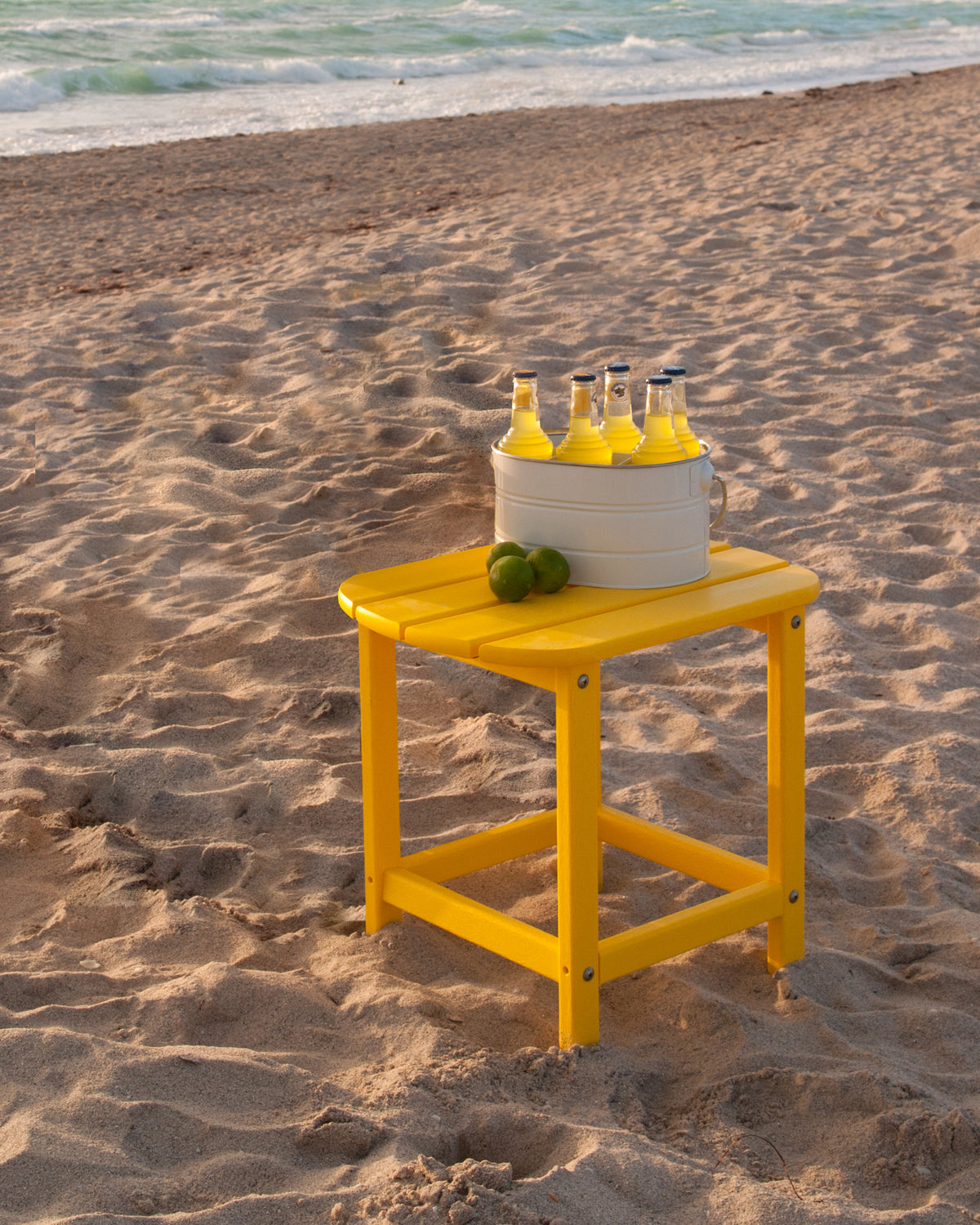 POLYWOOD South Beach 18" Side Table in Lemon in an outdoor setting