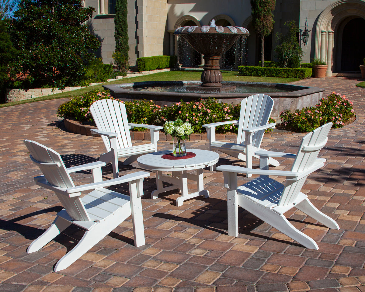 POLYWOOD Seashell Adirondack in White in an outdoor setting