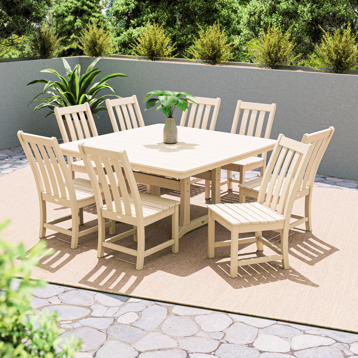Lifestyle photo of the POLYWOOD Vineyard 9-Piece Dining Set in Sand