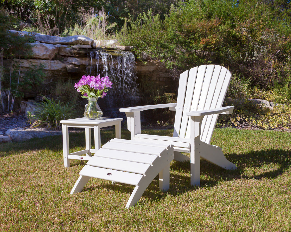 Lifestyle photo of the POLYWOOD Seashell Adirondack in White (2)