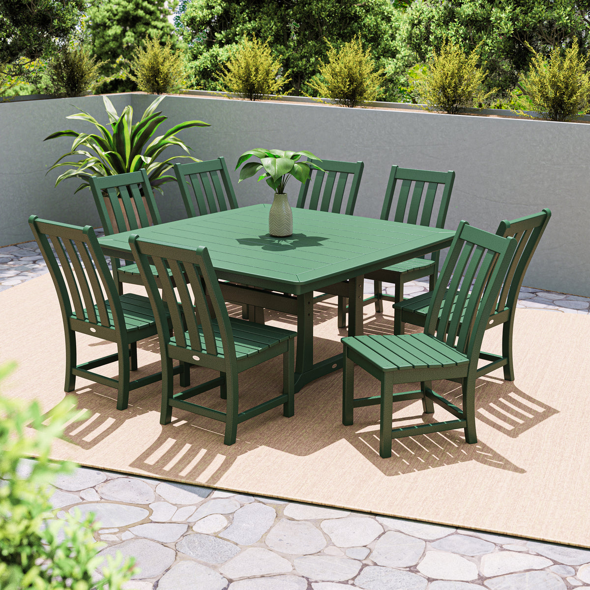 Lifestyle photo of the POLYWOOD Vineyard 9-Piece Dining Set in Green