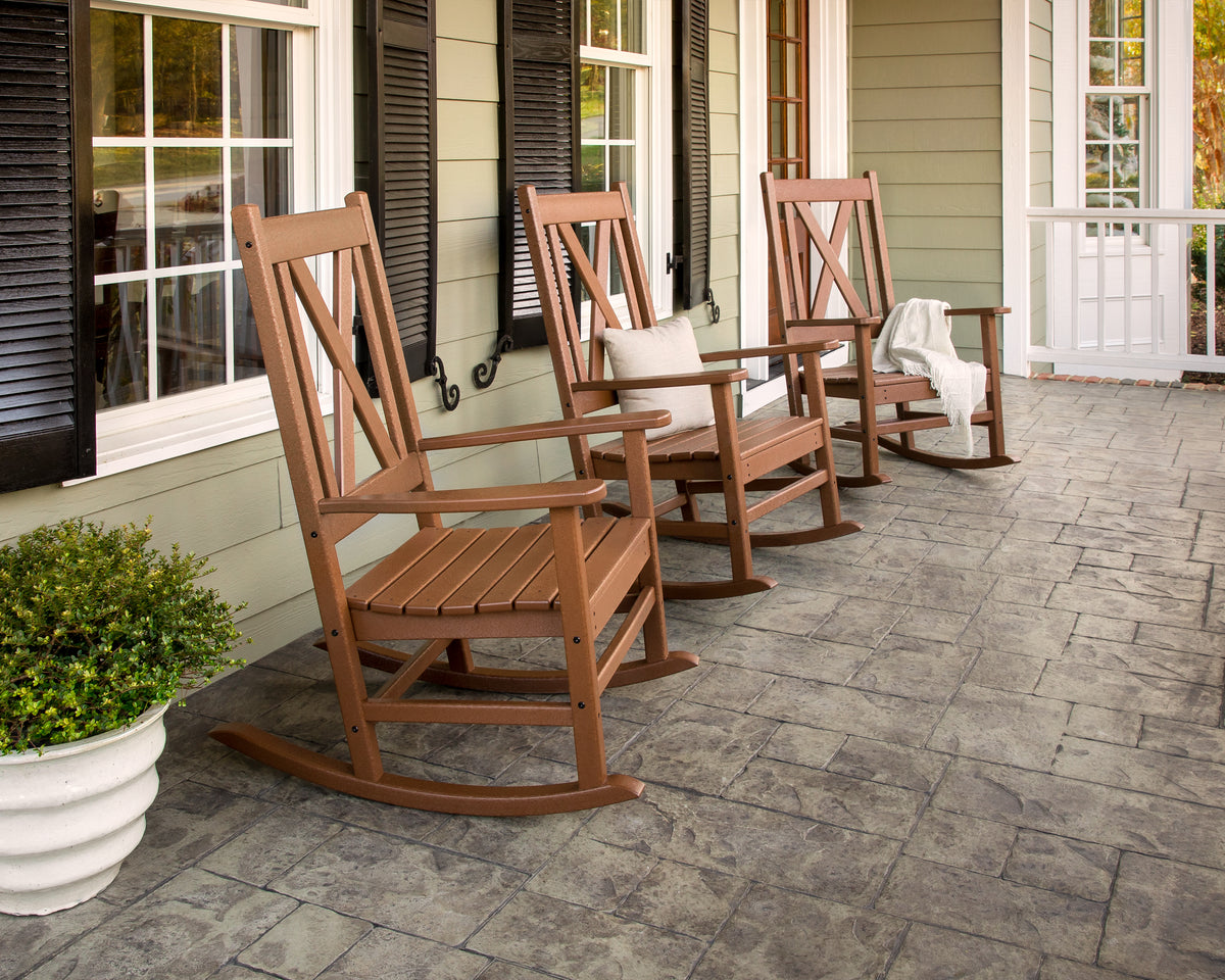 POLYWOOD Braxton Porch Rocking Chair in Teak in an outdoor setting