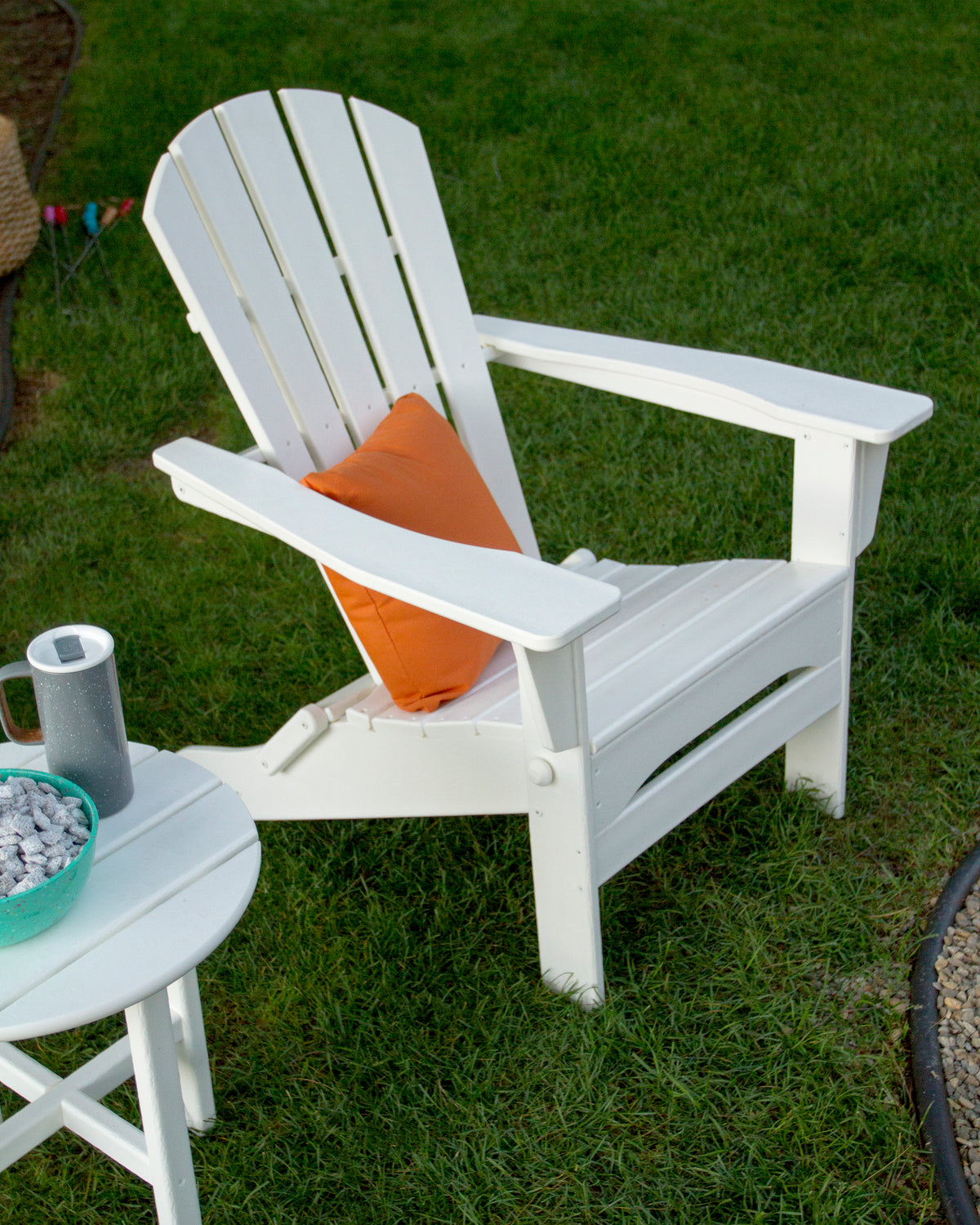POLYWOOD Palm Coast Folding Adirondack in White in an outdoor setting (2)
