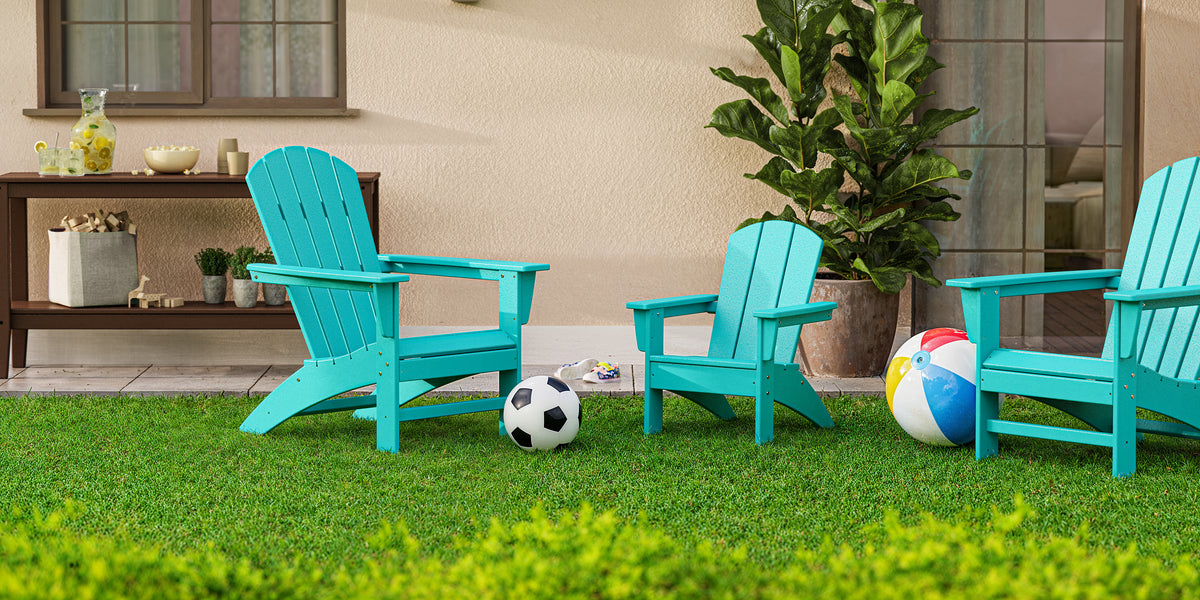 POLYWOOD Kids Nautical Adirondack Chair in Aruba styled outdoors
