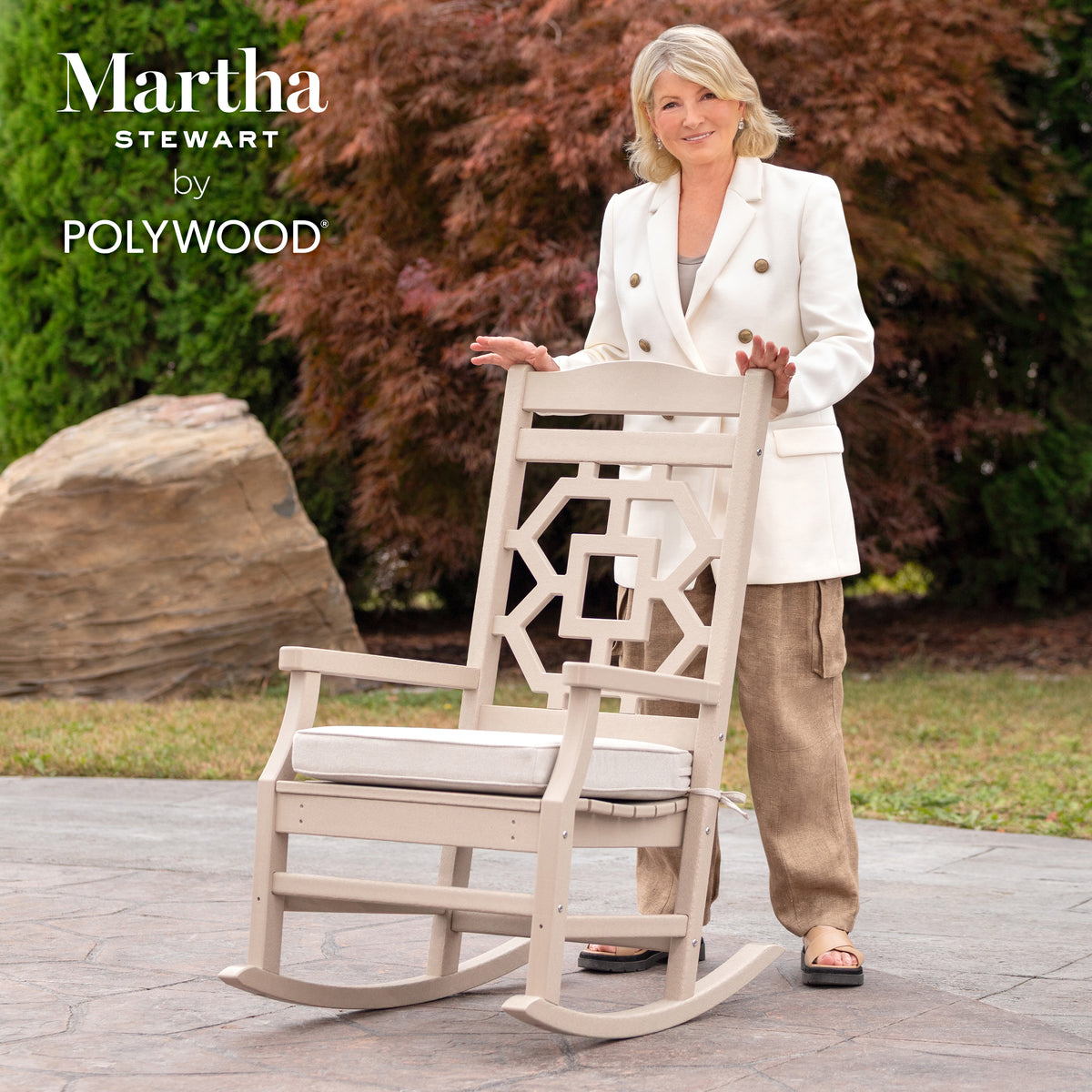 POLYWOOD Chinoiserie Rocking Chair in Sand in an outdoor setting