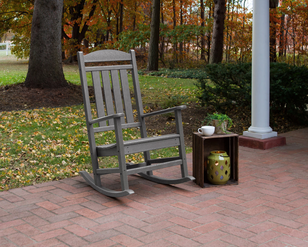 POLYWOOD Presidential Rocking Chair in Slate Grey in an outdoor setting