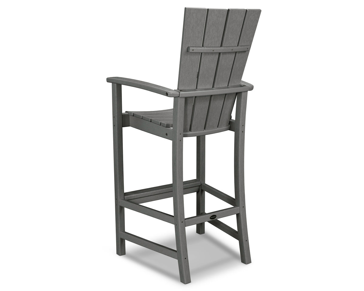 Angled view of the POLYWOOD Quattro Adirondack Bar Chair in Slate Grey