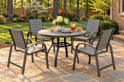 Berlin Gardens Murphy 42" Round Dining Set with 4 Poly Dining Chairs on a backyard patio
