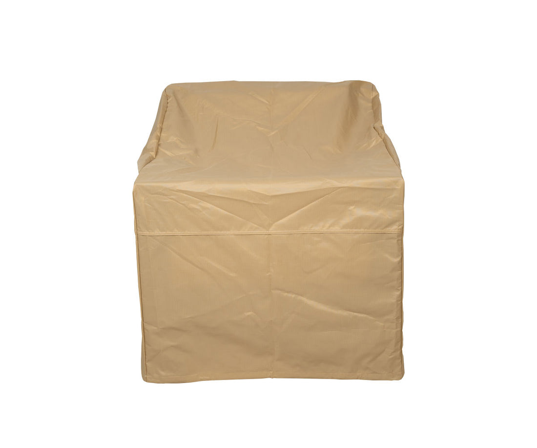 Berlin Gardens Nordic Vinyl Furniture Cover: tan vinyl cover fitted over a club chair