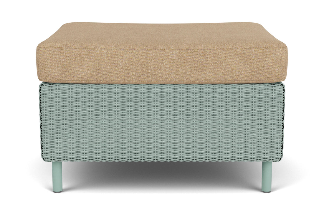 Lloyd Flanders Visions Ottoman in Sea Glass frame with Hayden Sand fabric
