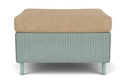 Lloyd Flanders Visions Ottoman in Sea Glass frame with Hayden Sand fabric