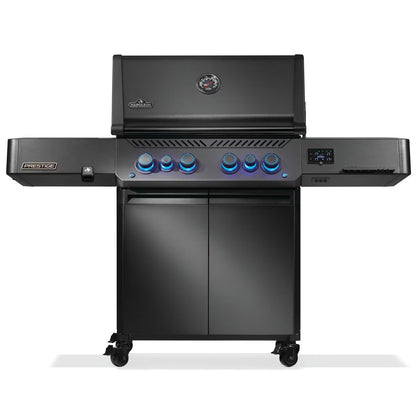 Black gas grill with digital display on a white background