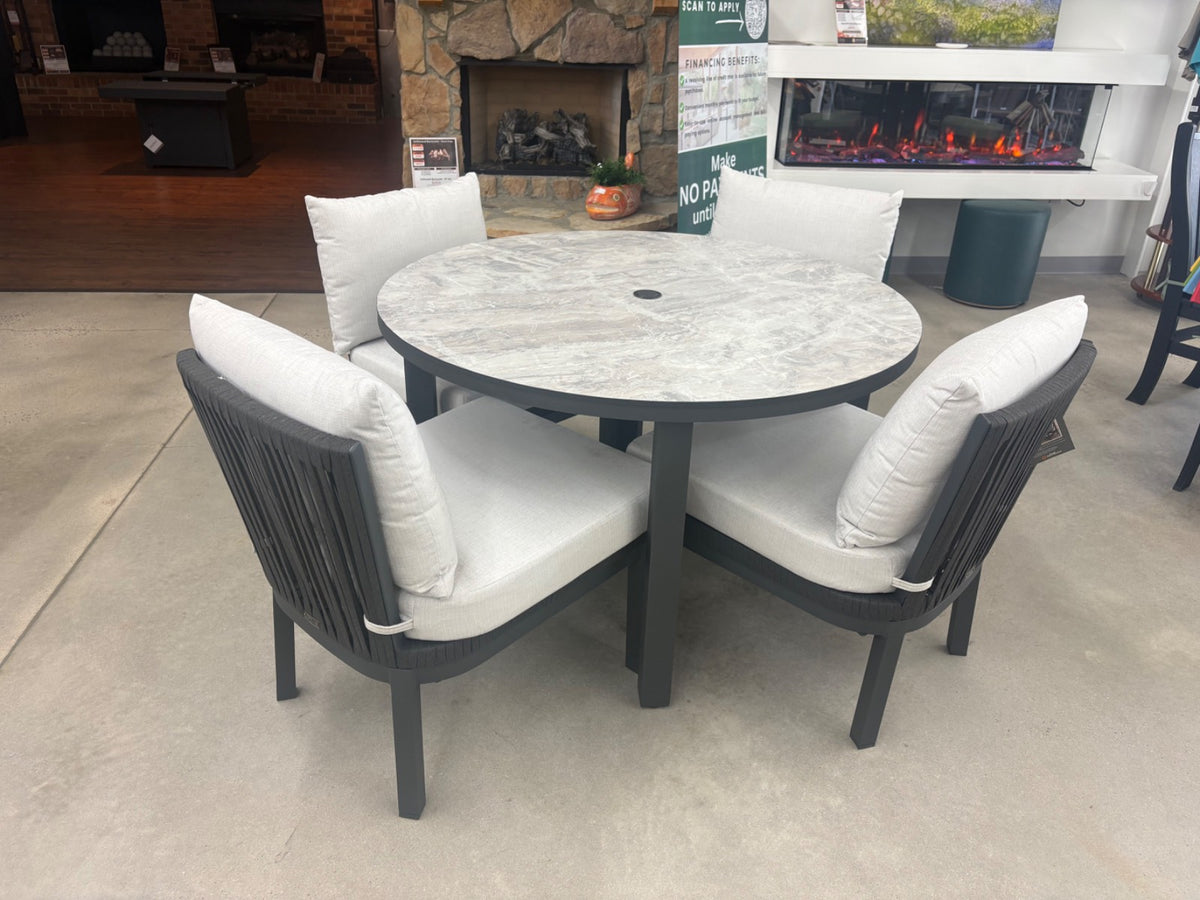 Preveli 5 Piece Dining Set floor model in the Winston Salem store