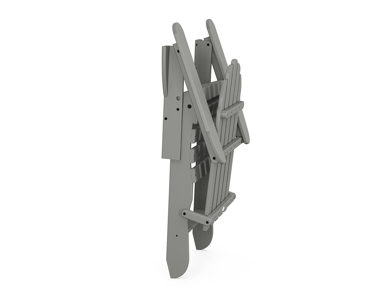 Angled view of the POLYWOOD Classic Folding Adirondack Chair in Slate Grey