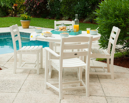 Lifestyle photo of the POLYWOOD 48" Round Farmhouse Dining Table in White