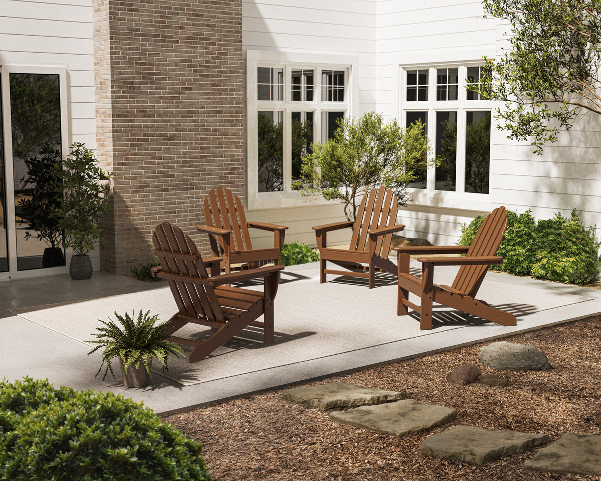 POLYWOOD 4-Piece Classic Adirondack Conversation Set in Teak in an outdoor setting