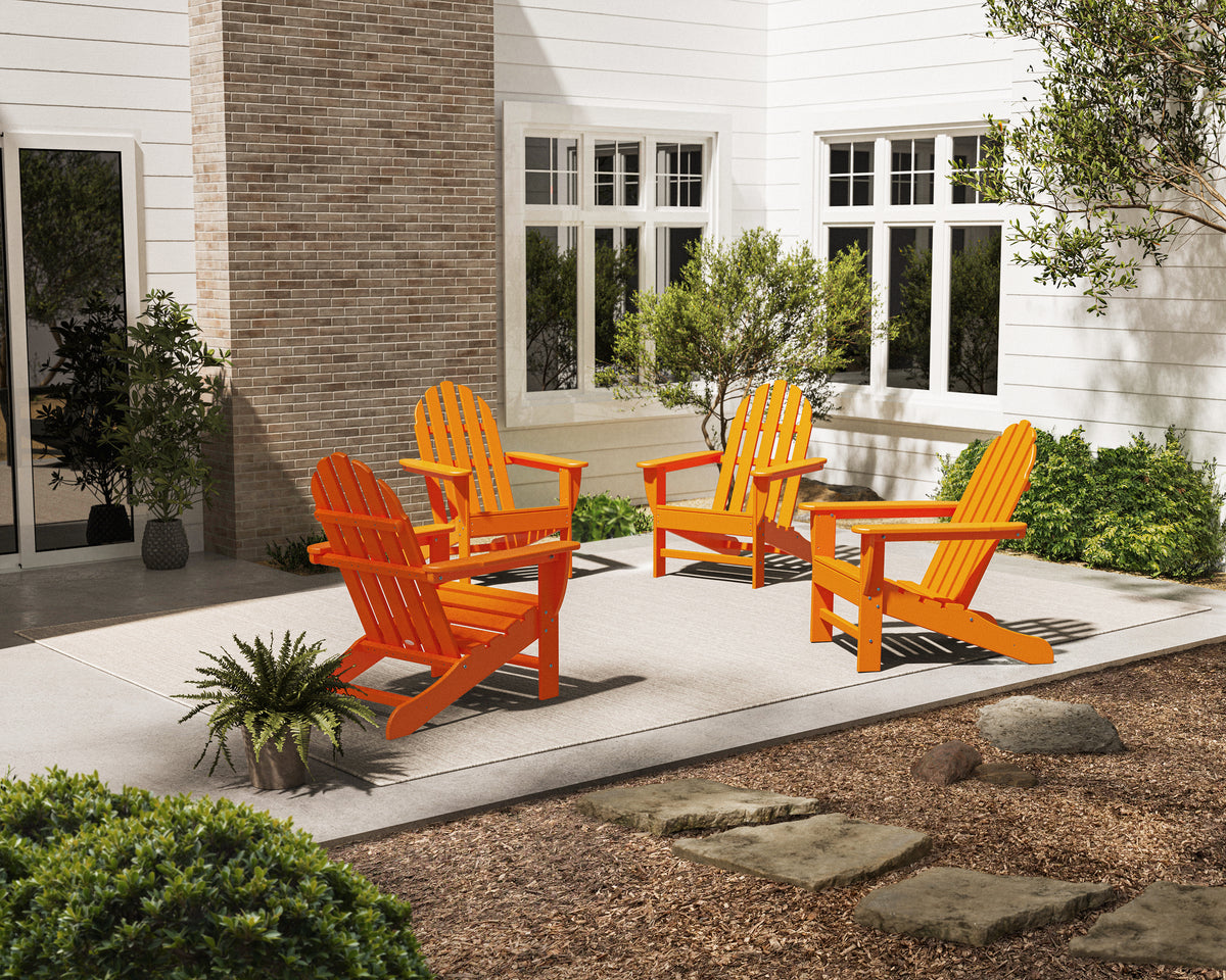 POLYWOOD 4-Piece Classic Adirondack Conversation Set in Tangerine styled outdoors