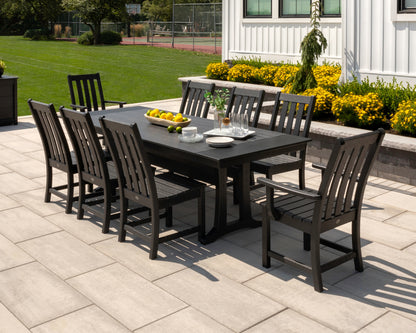 POLYWOOD Vineyard Dining Arm Chair in Black styled outdoors
